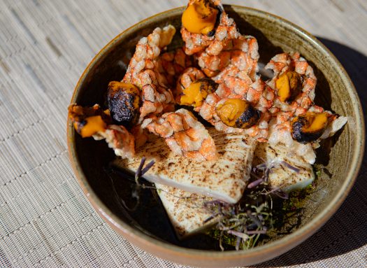 A bowl filled with authentic Chilean cuisine at Explora hotel lodge in San Pedro de Atacama.