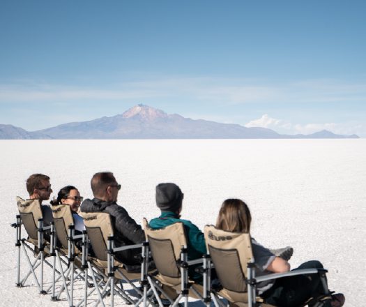 People relaxing Uyuni salt flats